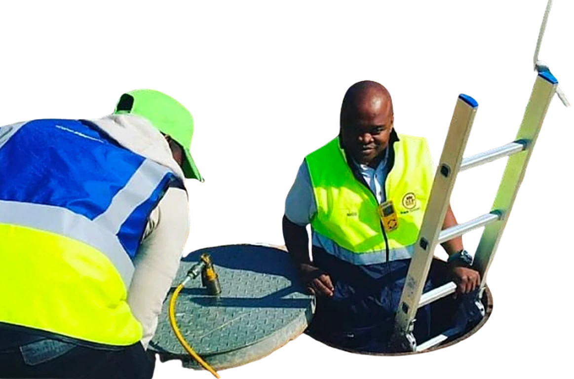 Deffinity Africa field team inspecting an underground services access point